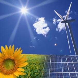 Sonnenblume, Windkraftrad, Wolken und Sonne im Himmel